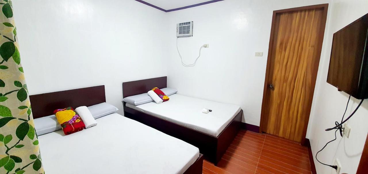 Sj Pabua Travellers Inn Mambajao Buitenkant foto
