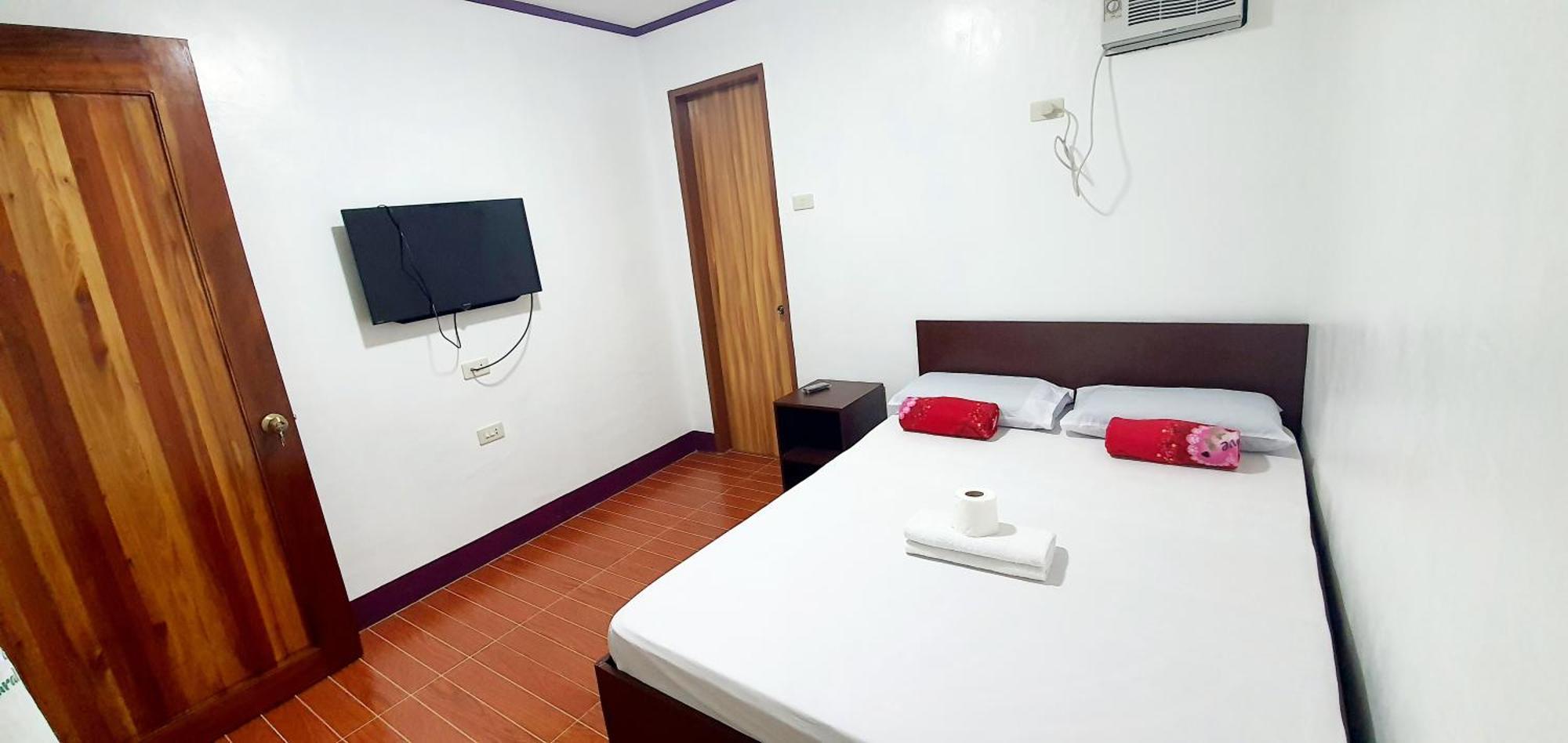 Sj Pabua Travellers Inn Mambajao Buitenkant foto